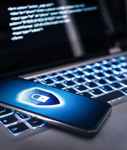 photo of mobile phone showing a graphic with shield and lock icon
